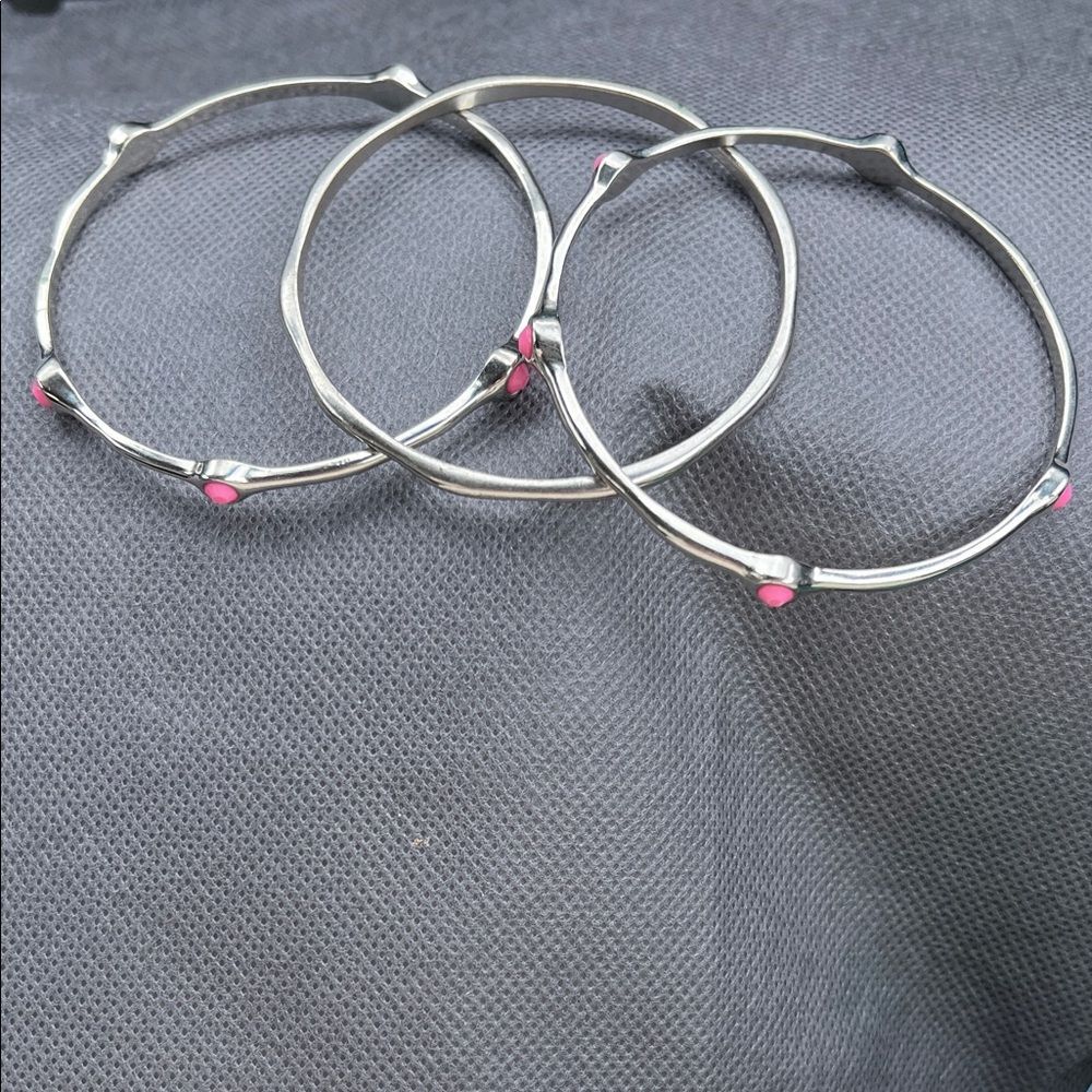 Silver toned Bangles with pink accents
